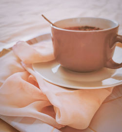 High angle view of coffee cup on table