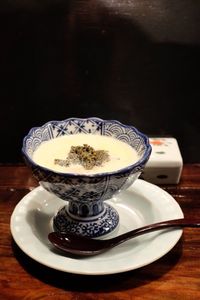 Close-up of coffee cup on table