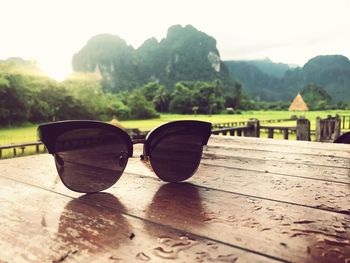 Close-up of sunglasses on table