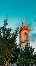 Low angle view of built structure against blue sky