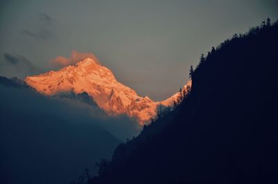 Scenic view of mountains against sky during sunset