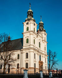 Low angle view of building against blue sky