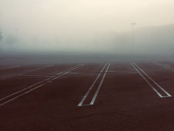 Empty road in foggy weather