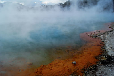 Smoke emitting from volcanic mountain