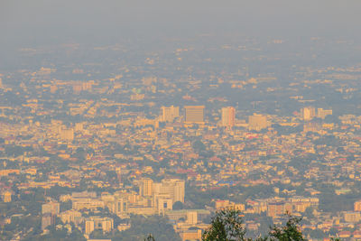 High angle view of buildings in city against sky