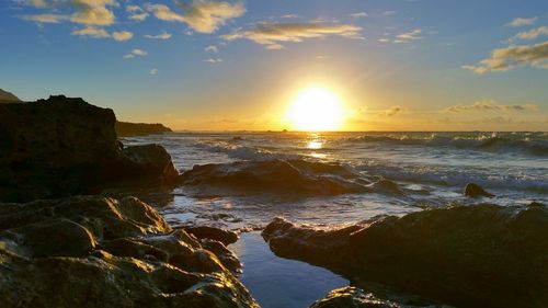 Scenic view of sea at sunset