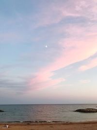 Scenic view of sea against sky at sunset