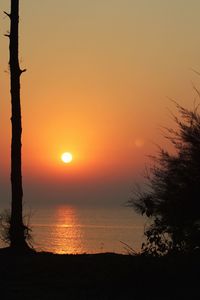 View of calm sea at sunset