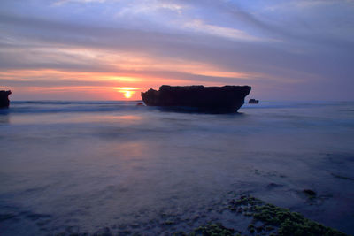 Scenic view of sea against sky during sunset