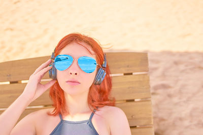 Portrait of beautiful woman wearing sunglasses