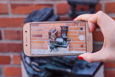 Close-up of person using mobile phone