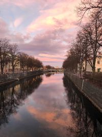 Scenic view of river against sky during winter
