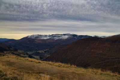 Scenic view of mountains against sky