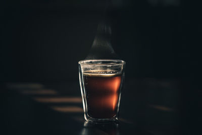 Close-up of beer glass on table