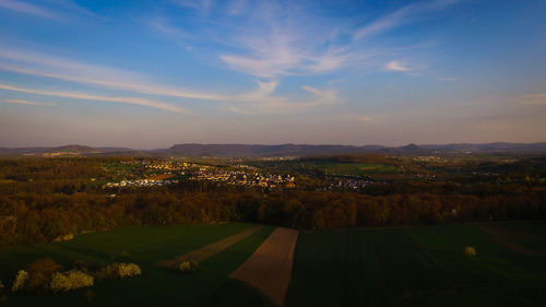Scenic view of landscape against sky during sunset