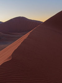 Scenic view of desert against clear sky