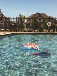 Woman swimming in pool