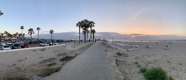 Scenic view of beach against sky during sunset