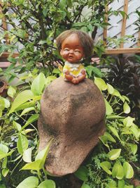 Close-up of smiling boy holding food