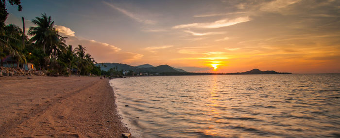 Scenic view of sea at sunset