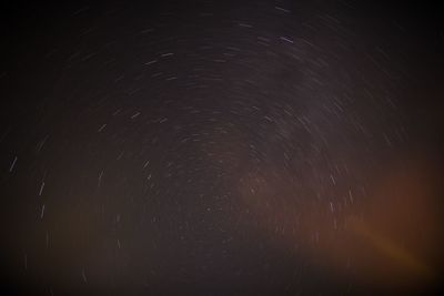 Low angle view of stars in sky at night