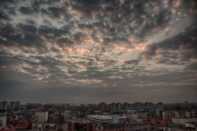 High angle view of buildings against sky at sunset