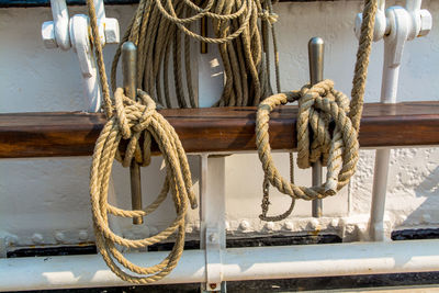Rolled ropes on boat railing