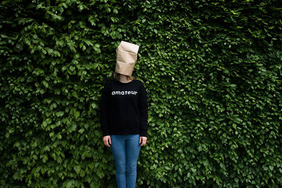 View of woman standing against plants