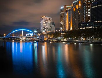 Illuminated city buildings at night