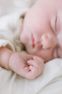 Closeup of a sleeping newborn's hand