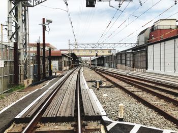 Railroad station platform against sky