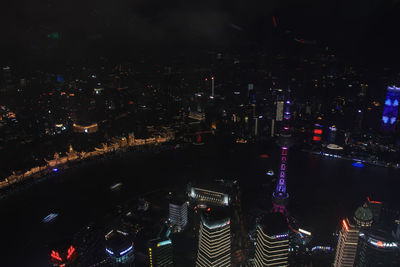 High angle view of illuminated buildings at night