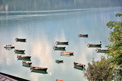 High angle view of boats moored in lake