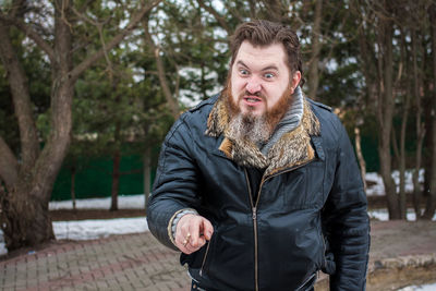 Man standing outdoors during winter