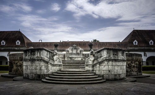 Low angle view of old building against sky