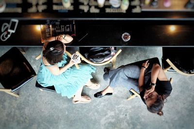 High angle view of people on floor