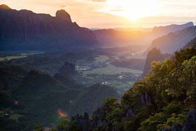 Scenic view of mountains against sky during sunset