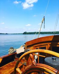 Nautical vessel on sea against sky
