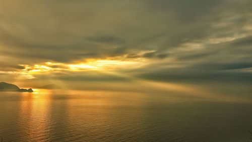 Scenic view of sea at sunset