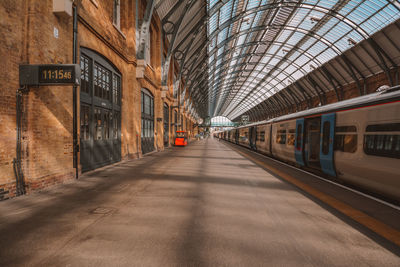 Train at railroad station in city