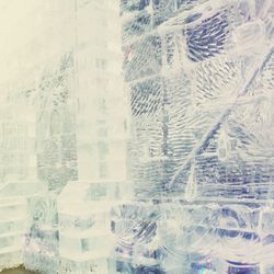 Full frame shot of glass window in snow