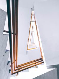 Low angle view of communications tower against sky