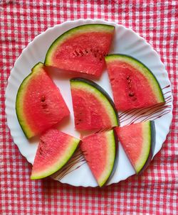 High angle view of fruits in plate on table