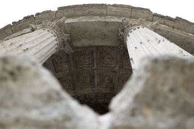 Low angle view of old ruin against sky