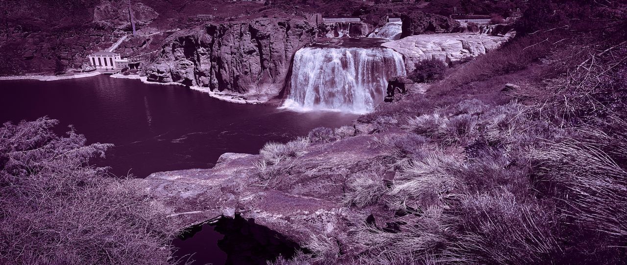 VIEW OF WATERFALL IN ROCK