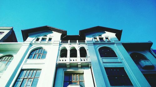 Low angle view of built structure against blue sky