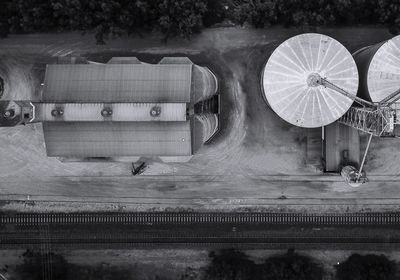 High angle view of ferris wheel by lake