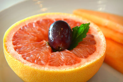 Close-up of fruits in plate