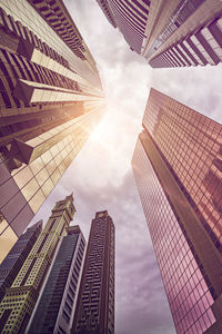 Low angle view of buildings against sky in city