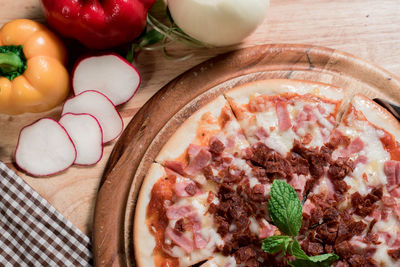 High angle view of pizza on table